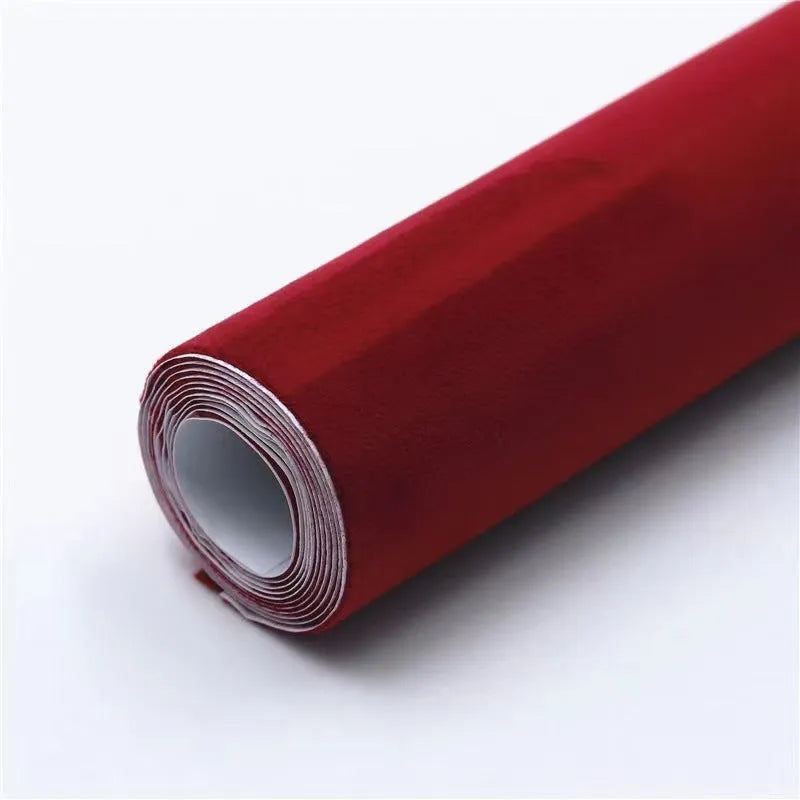 Self-adhesive leather suede sheet roll in multiple colour swatches showing black, brown, blue, and red.