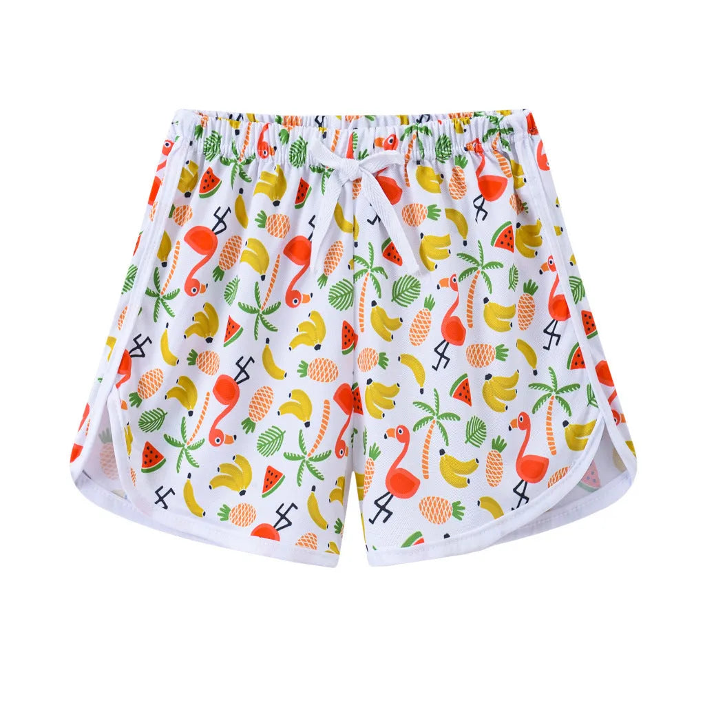 Children's polyester beach shorts in various colours and patterns including stripes, prints and solid options