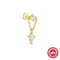 Geometric kite-shaped sterling silver earring with rhinestone head and gold chain tassel.