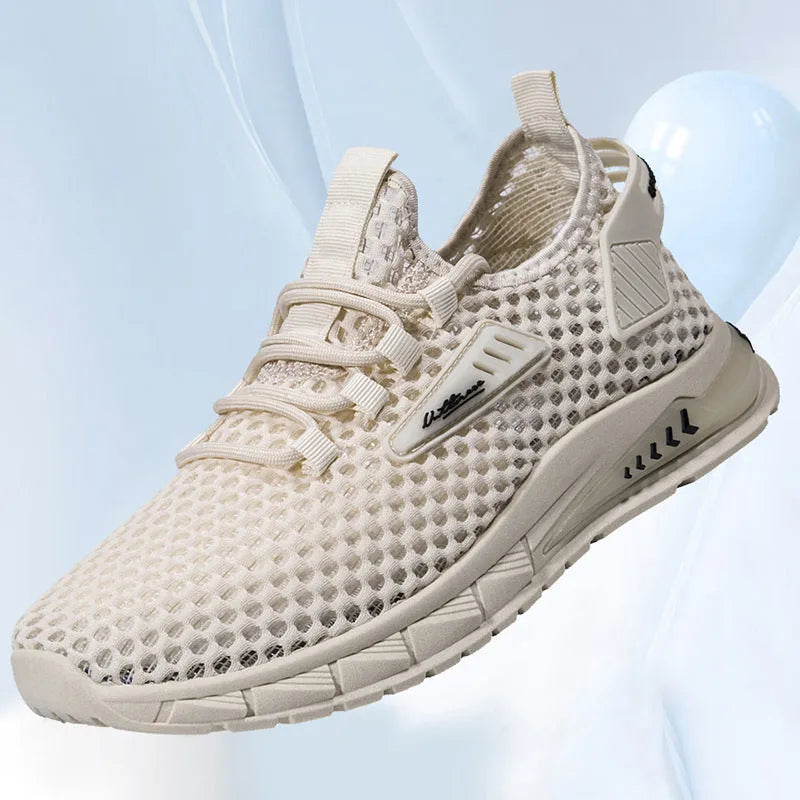Men's beige casual sneaker with synthetic leather upper, mesh lining, and lace-up front.
