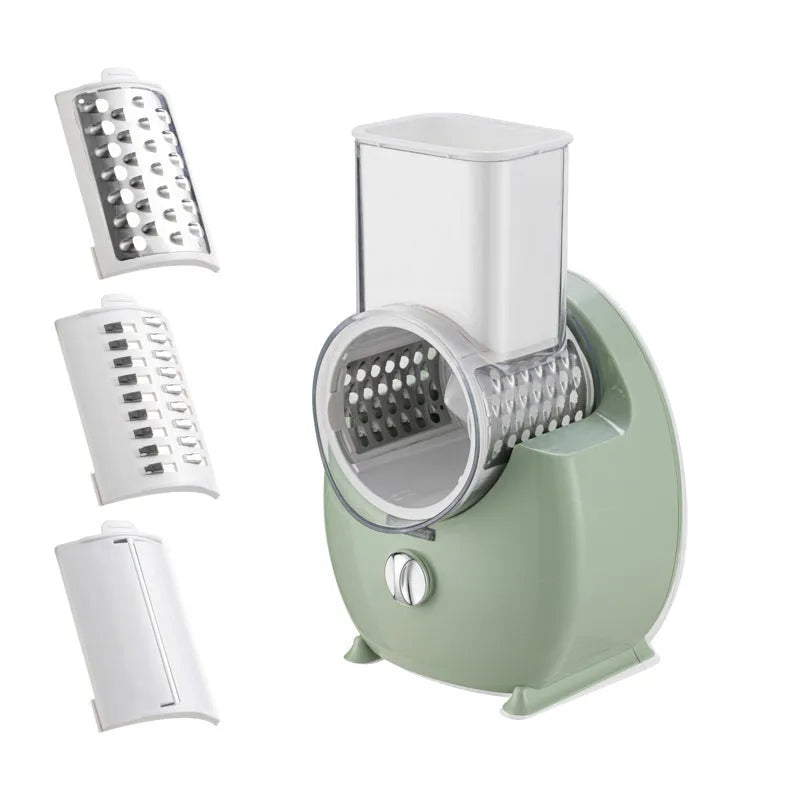 White electric vegetable slicer with rotary grater, three blades, and suction base on kitchen counter
