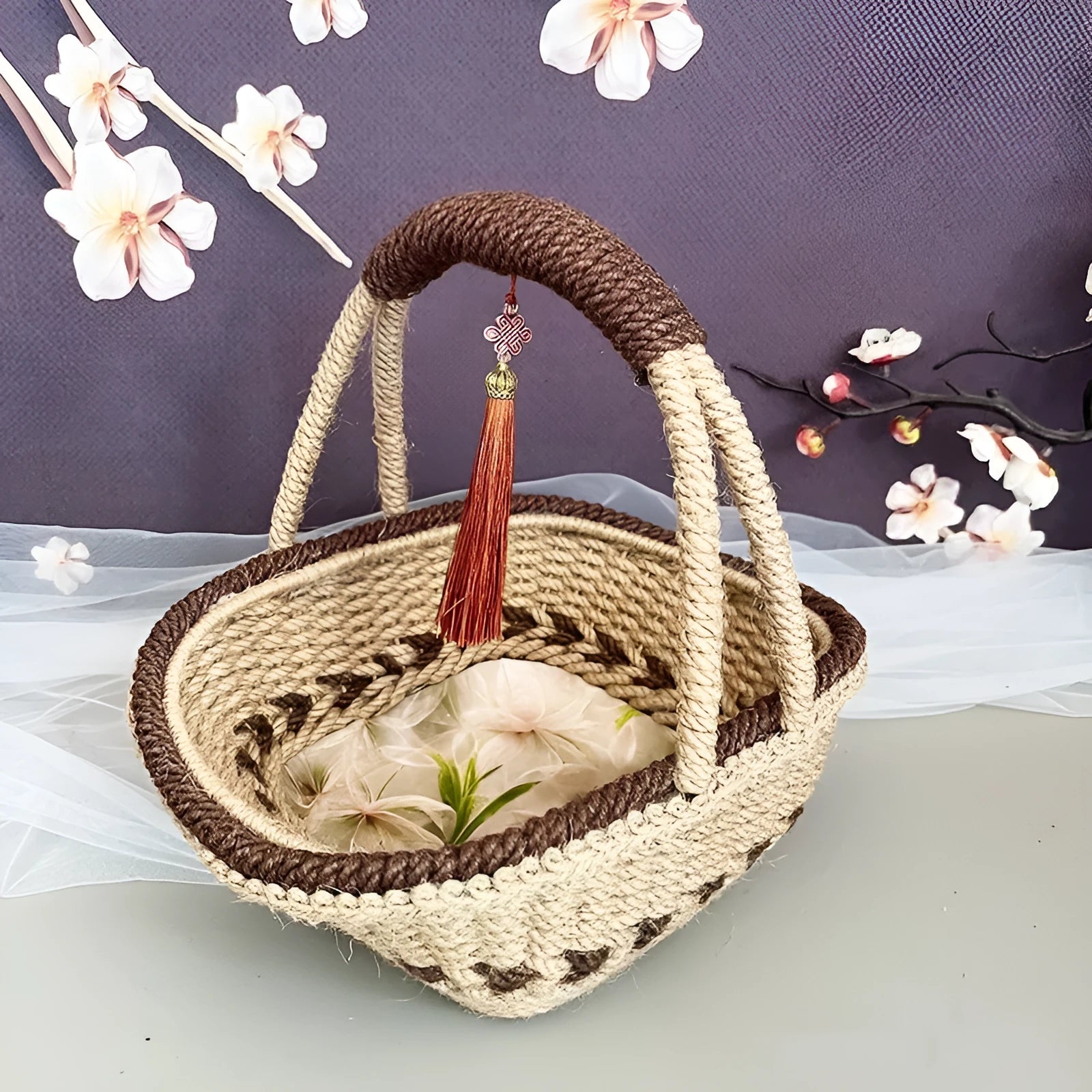 Hand-woven straw basket with hemp rope detailing in rustic style