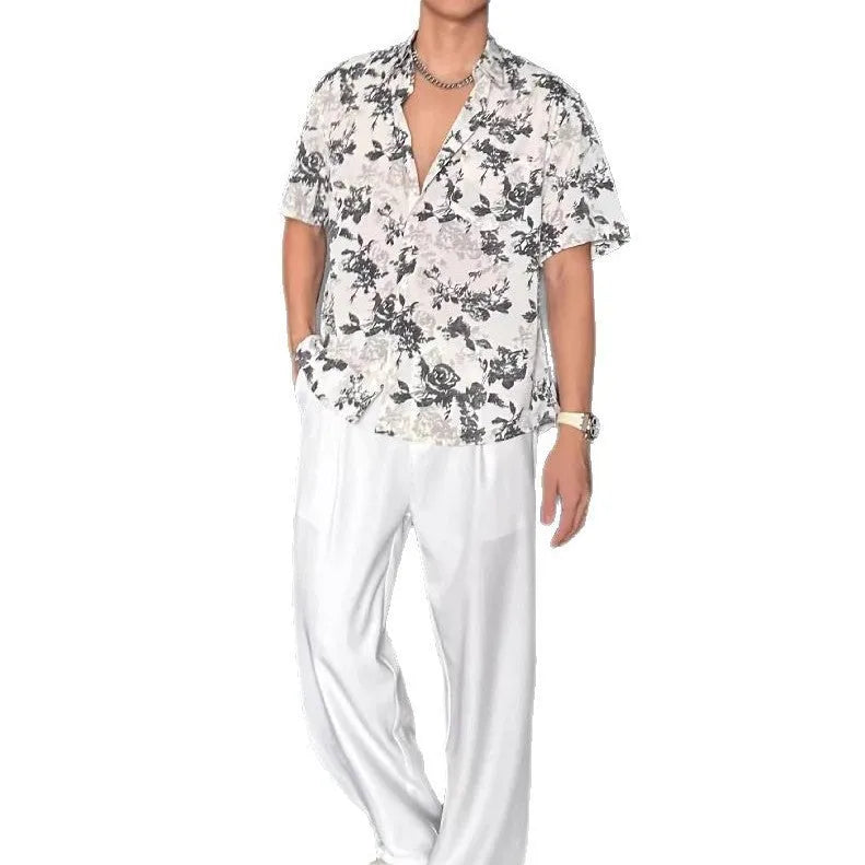 Men's loose black floral printed casual shirt with short sleeves and cardigan style