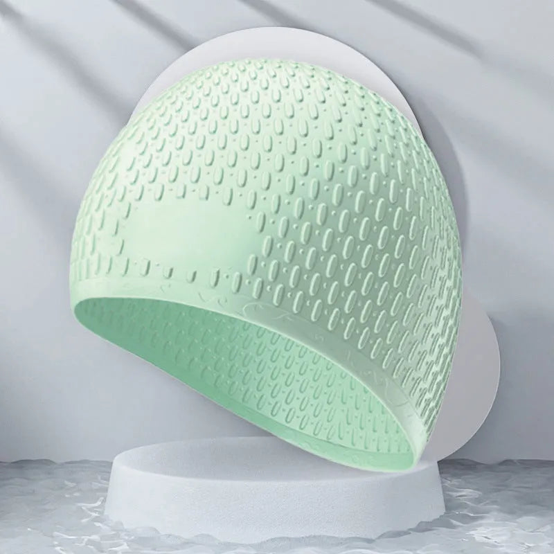 Silicone swimming cap with water drop design in solid colour options