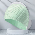 Silicone swimming cap with water drop design in solid colour options