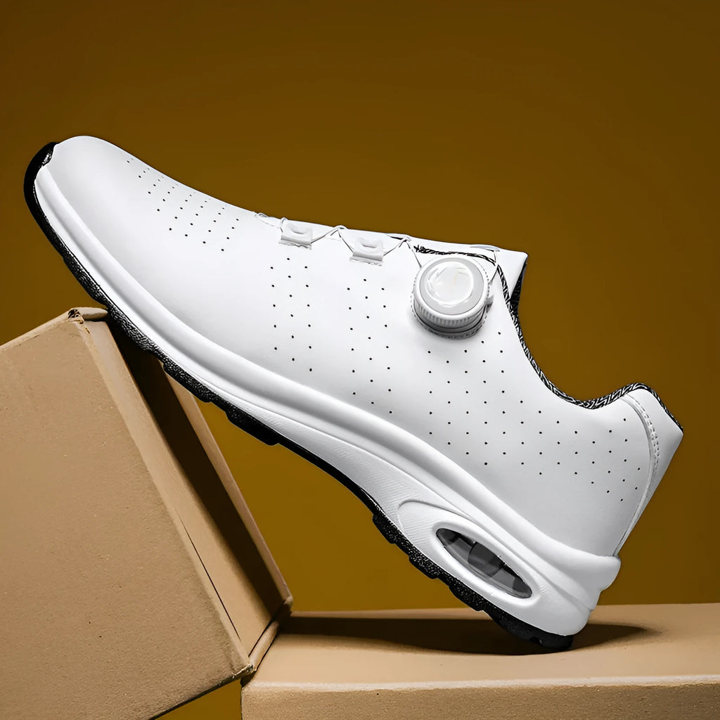 Low top casual shoes with mesh upper and cross strap design in black or white colour options