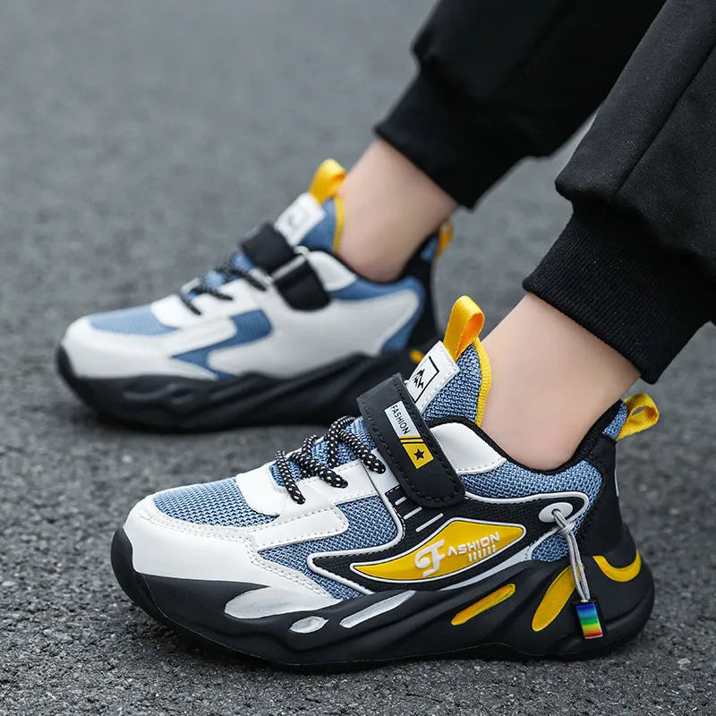 Boys' dark blue and black platform sports running shoes with Velcro strap and mesh upper.