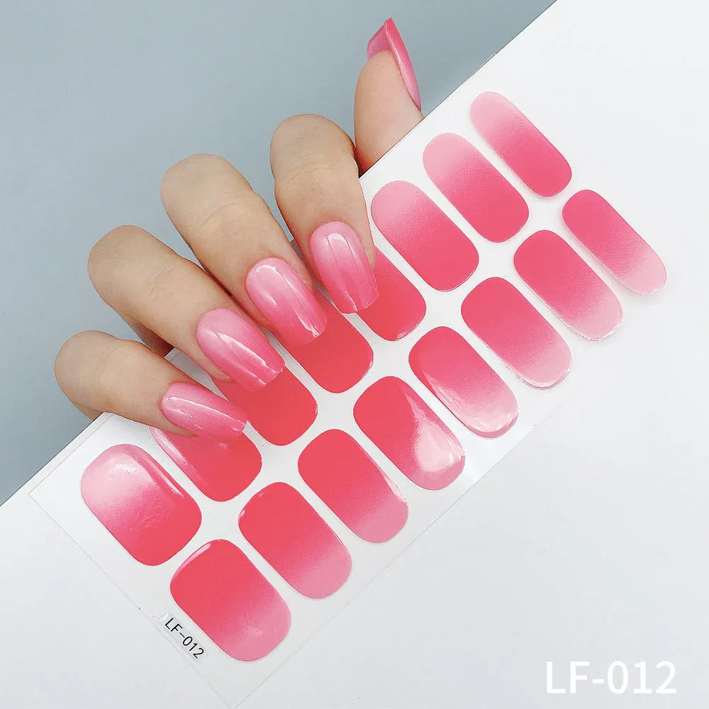 Full nail art sticker sheet showing 16 different solid colour designs including European simple nails and floral patterns
