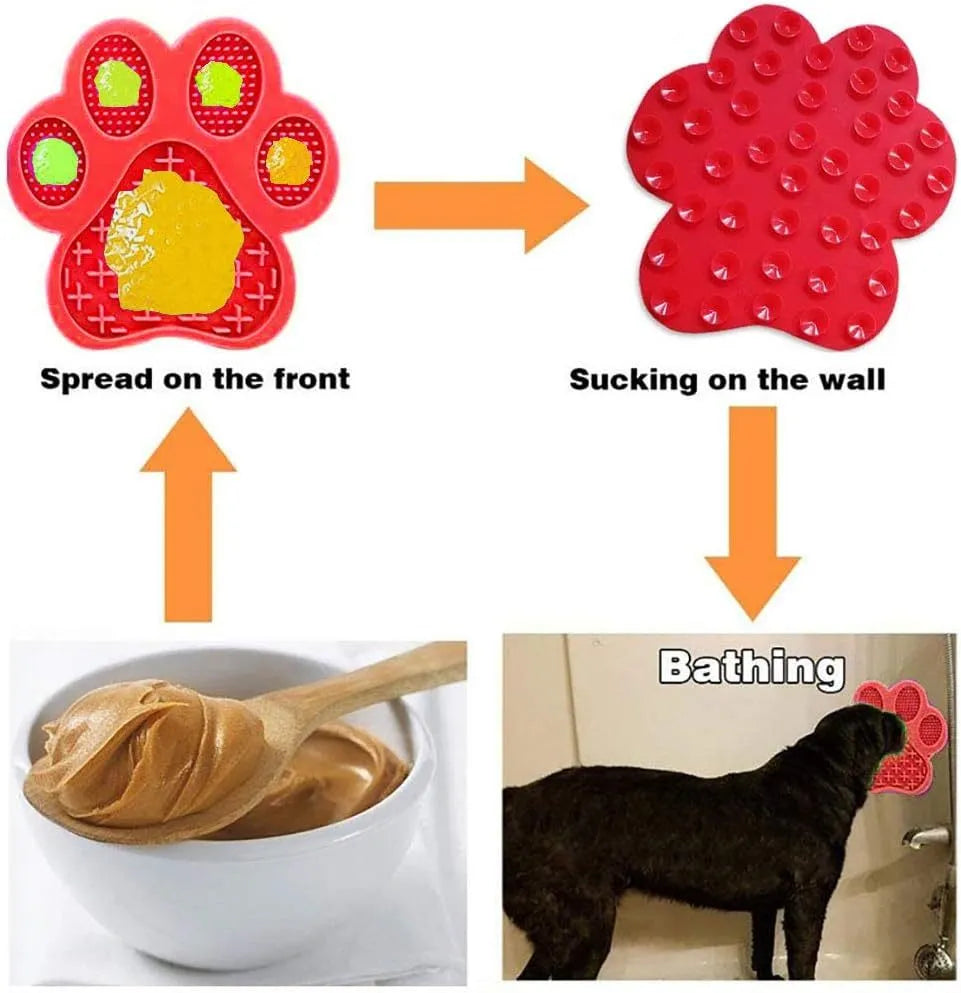 Blue silicone dog licking mat with bone-shape texture and suction cups on a tiled wall.