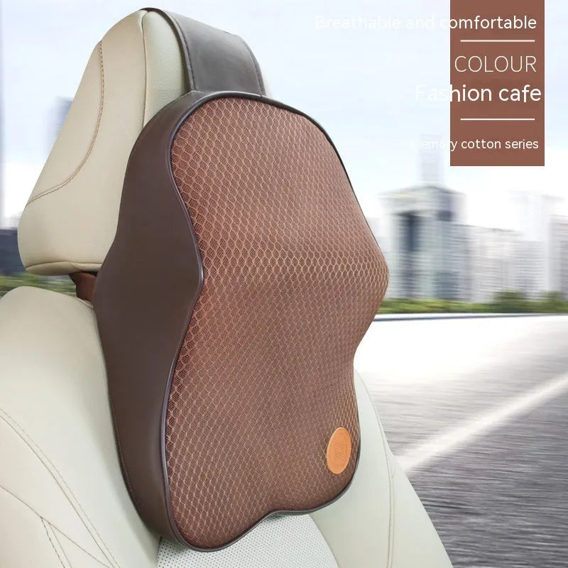 Black and brown memory foam car headrest pillow and lumbar support cushion set on a car seat.