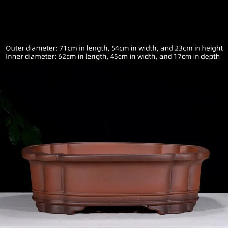 Large antique finish purple clay flower pot with Chinese styling, dimensions 71cm long by 54cm wide