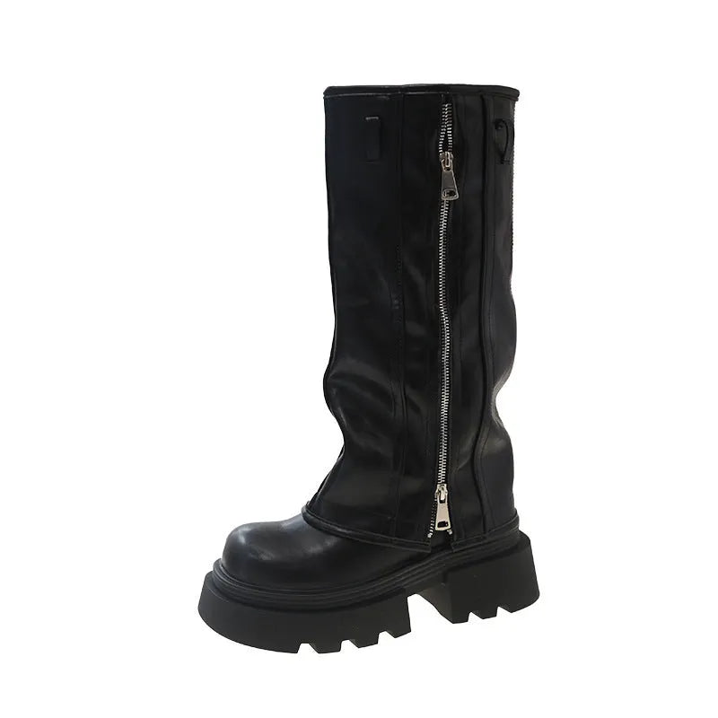 Women's black platform Martin boots with square heels and high cylinder socks on wooden floor