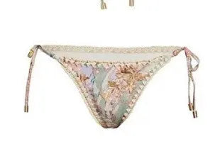 Women's creamy-white floral bikini set with matching skirt for beach and swimming