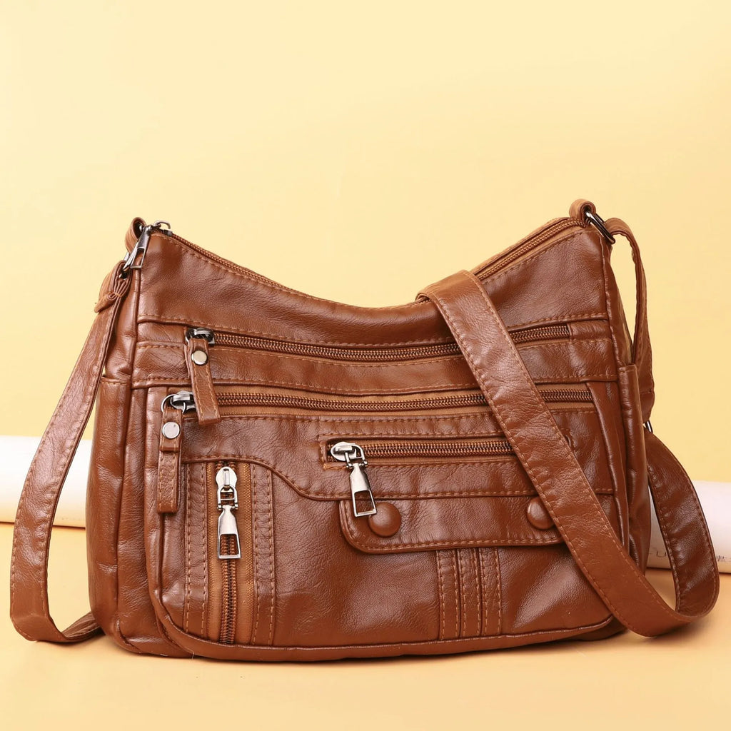Soft PU leather shoulder bag for women in 8022 Black, with zippered compartments and cross-body strap