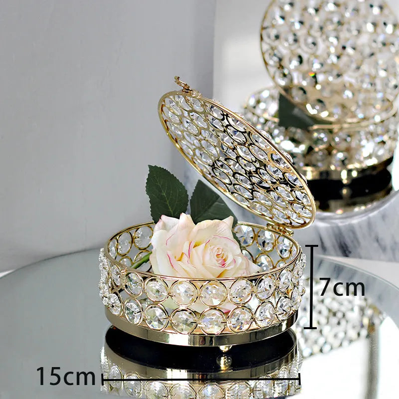 French gold metal frame jewellery box with transparent crystal glass panels displaying contents