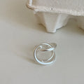 Geometric open ring for women with interlaced matte metal design and real gold plating