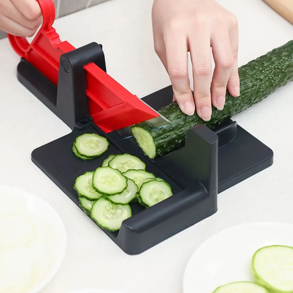 Green plastic vegetable cutter with stainless steel blades for cutting carrots and potatoes