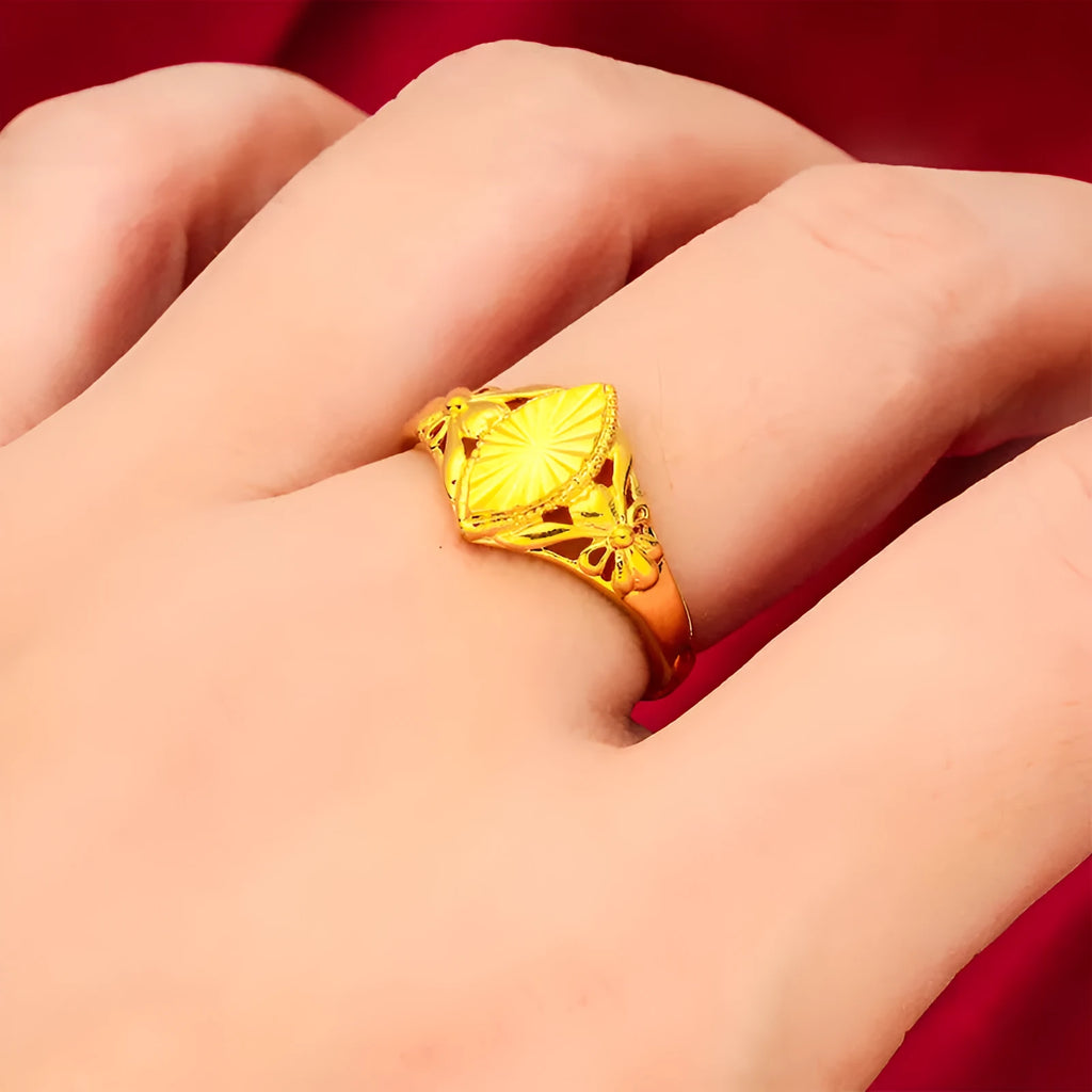 Alluvial gold tone open diamond flower ring with geometric design and textured surface