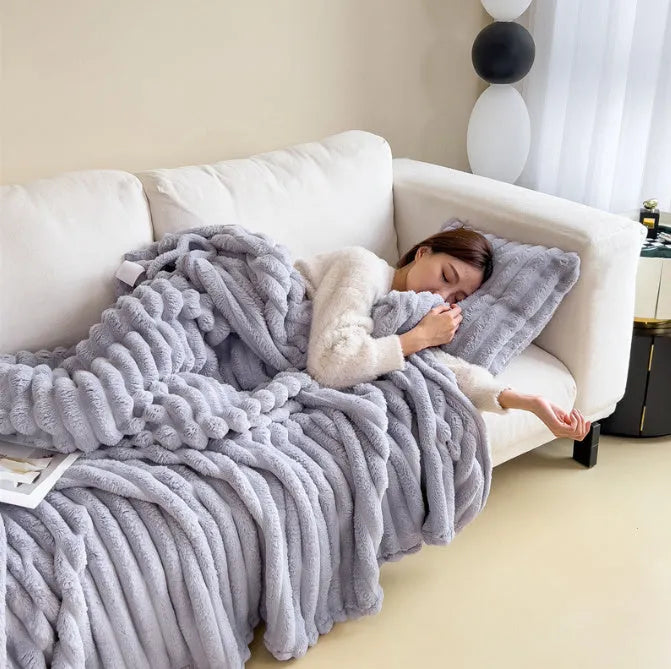 Solid colour bubble faux rabbit fur double-sided thickening blanket shown in a khaki colour