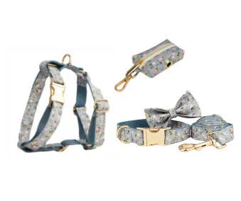 Floral polyester cotton dog collar set with matching leash, vest, bow, and poop bag accessories