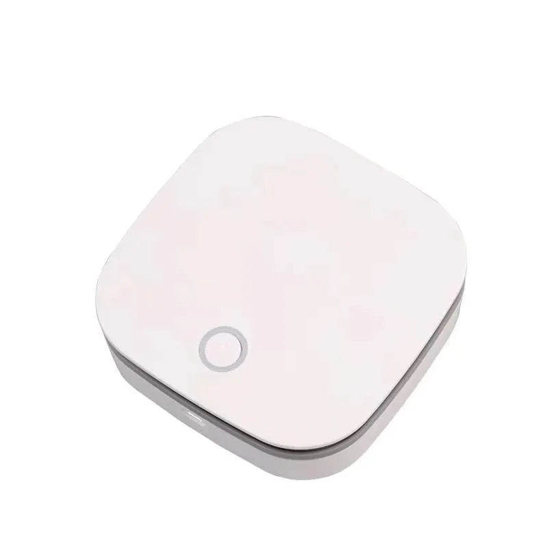 White USB-powered air purifier and disinfection machine for car and small room use.