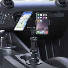 Silicone automobile phone holder Peak-X5 on car dashboard with phone attached