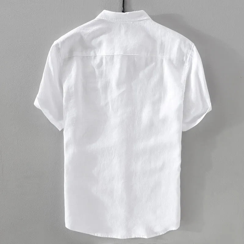 Men's loose fit short sleeve linen shirt in apricot colour on a hanger