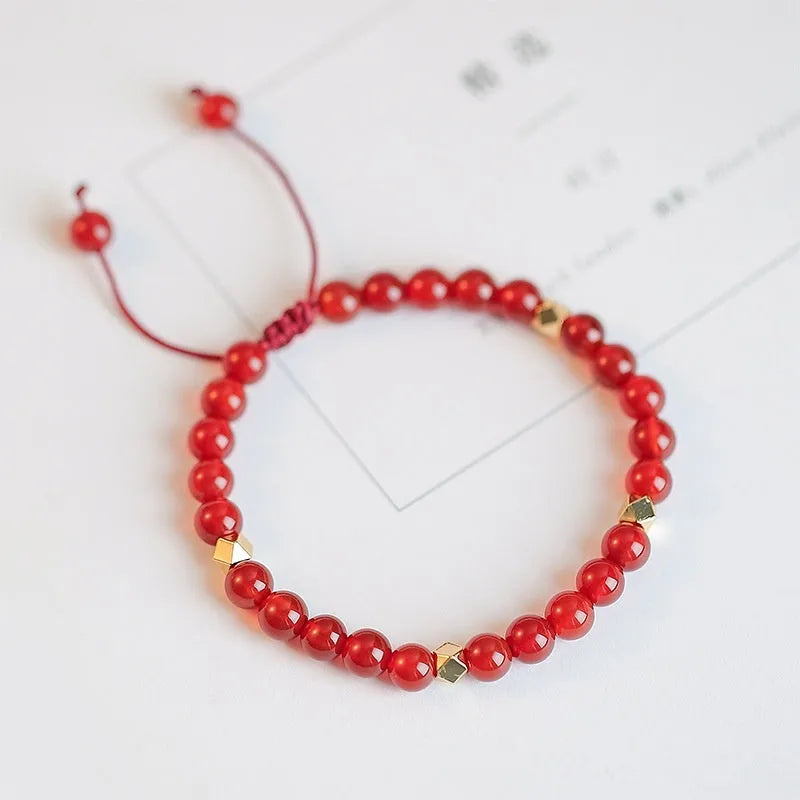 Hand-woven red agate beads bracelet with diamond-shaped arrangements in ethnic style design