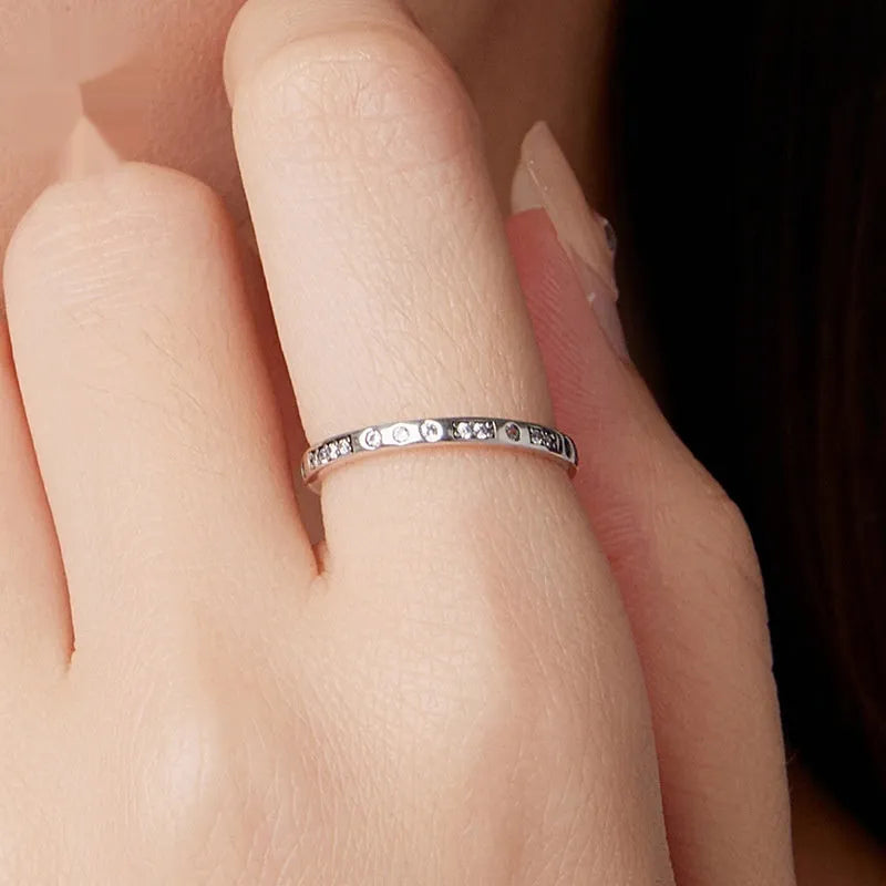 Silver alloy ring with oxidised black 'I Love You' design in Moss Password style