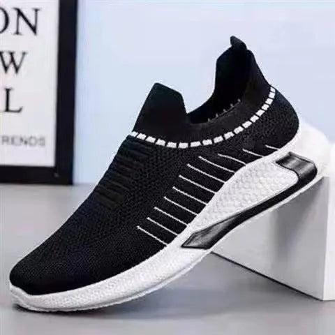 Men's black and white mesh sock sneakers with a striped design and lace-up front.