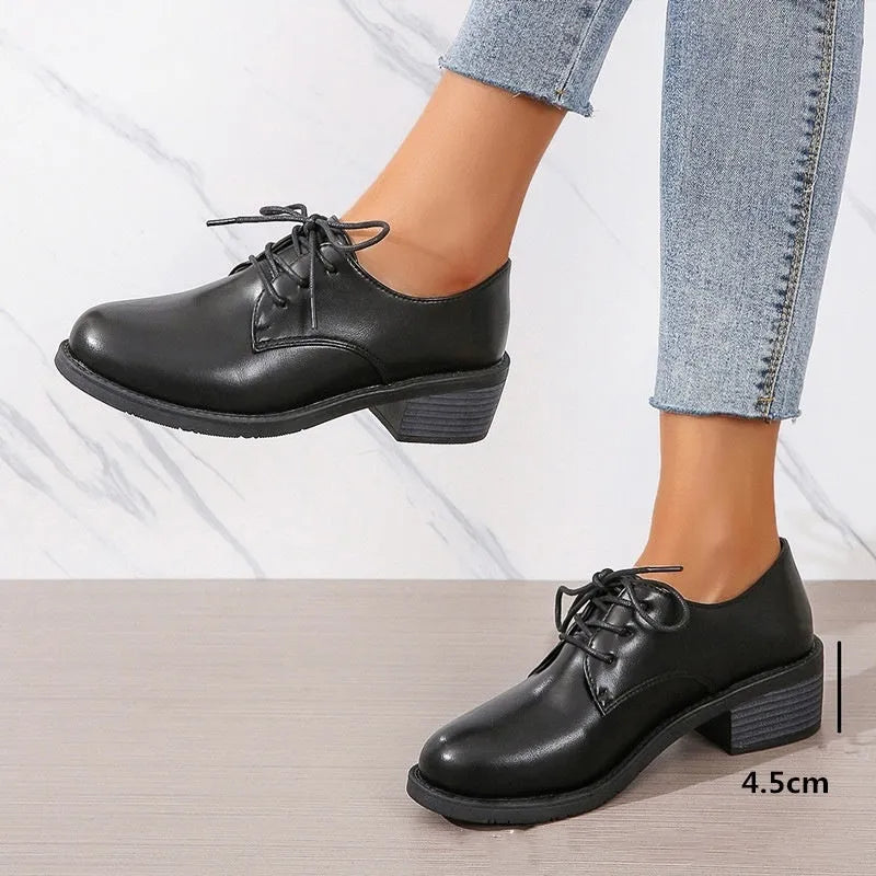 Black women's work shoes with chunky heel and soft rubber sole