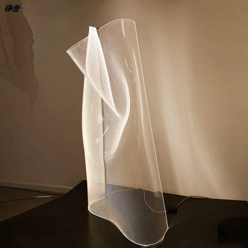 Irregular artistic acrylic ribbon table lamp in living room setting