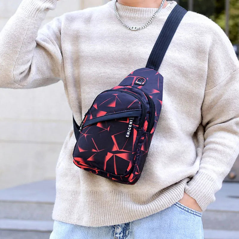 Men's Oxford cloth crossbody chest bag with earphone hole, showing zipper closure and vertical messenger style