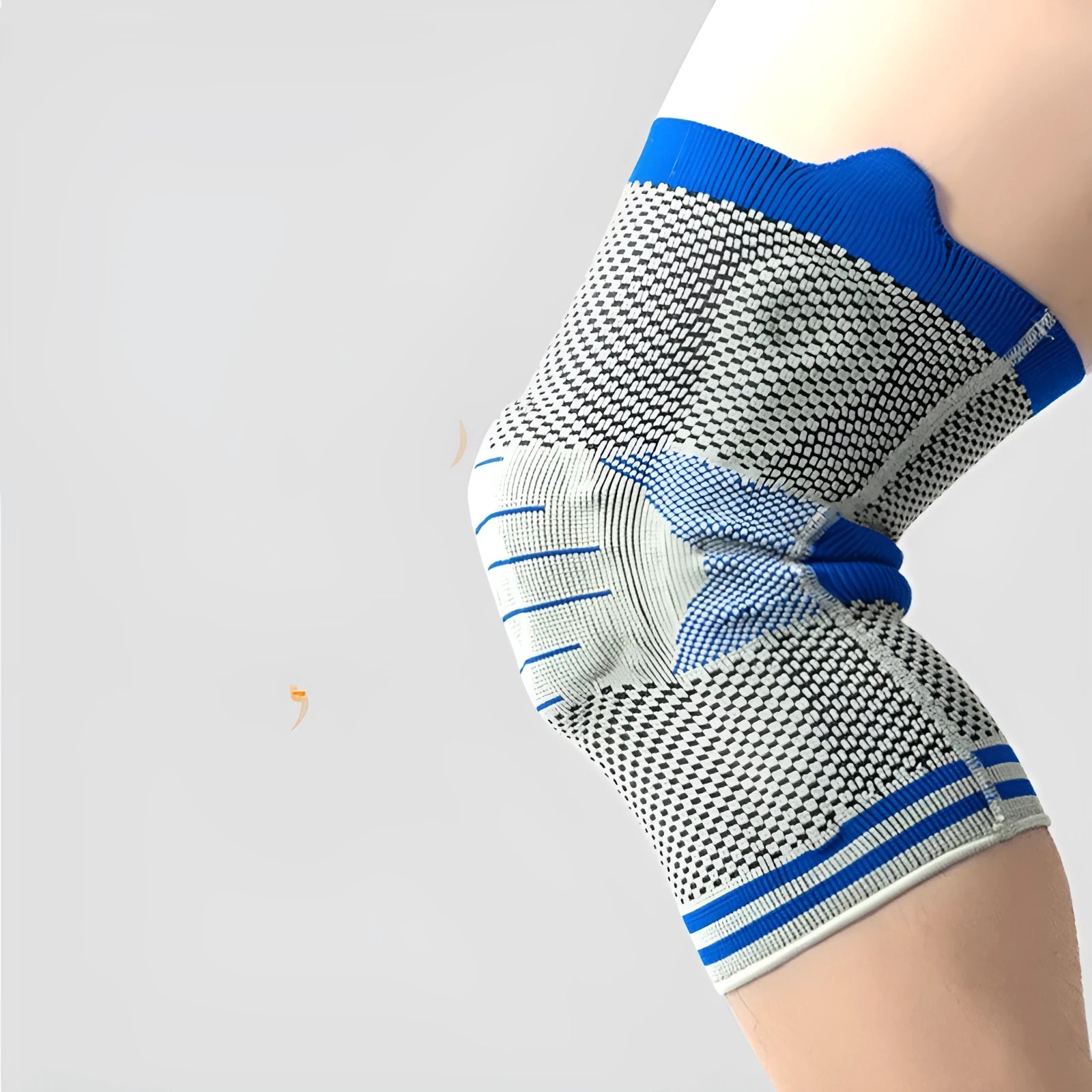 Cotton knee pad with visible silicone spring bar shock absorber in Black and Gray colour scheme.