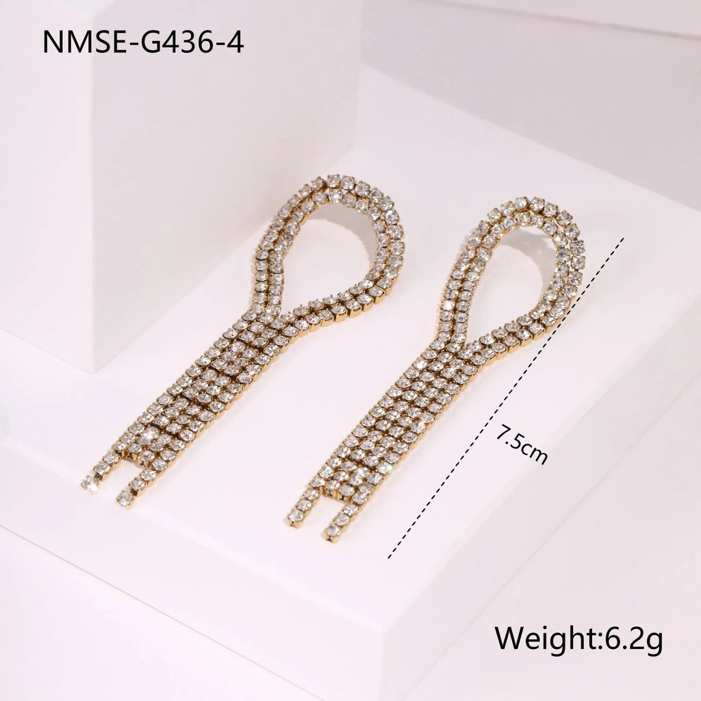Stainless steel heart-shaped earrings with geometric star detailing and 18K gold electroplated finish