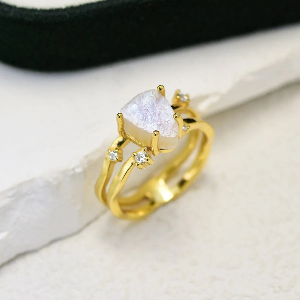 S925 silver geometric ring with irregular triangle design and moonstone detail in rose gold electroplating
