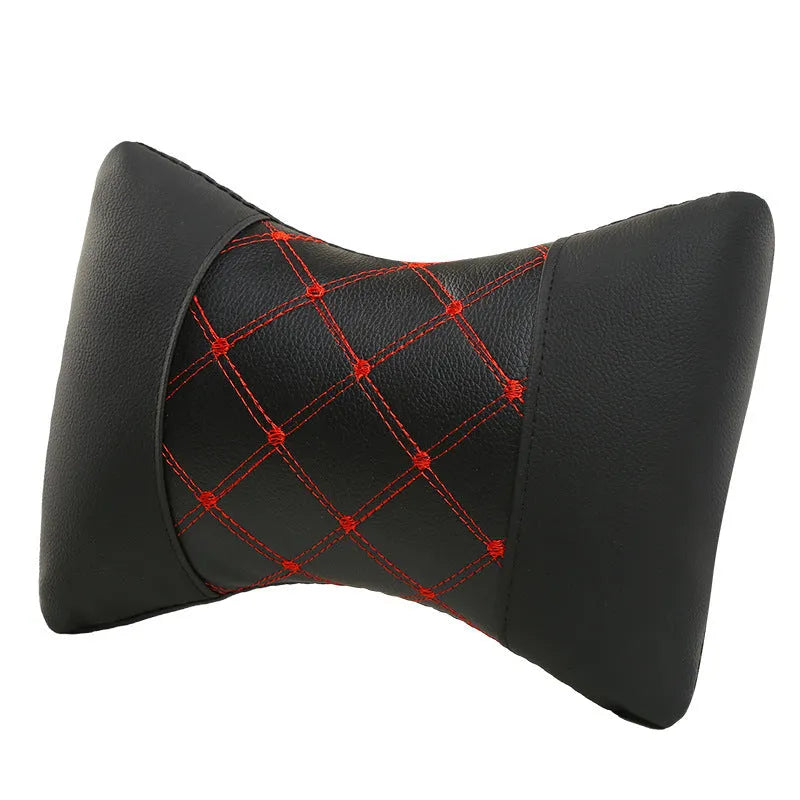 Black quilted artificial leather car headrest pillow with contrast stitching for neck support.
