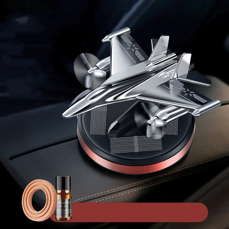 Solar powered rotating fighter aircraft perfume ornament in metallic finish with essential oil diffuser