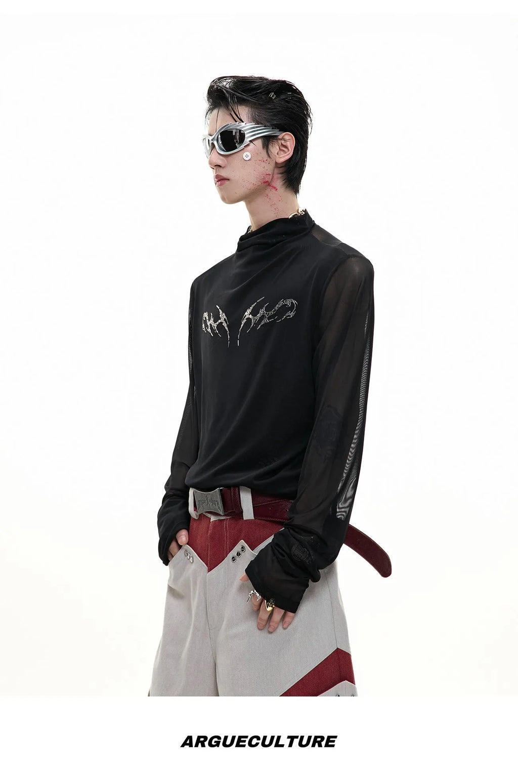 Men's black slim-fit mesh long-sleeve bottoming shirt laid flat, showing texture.