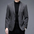 Man wearing a solid colour loose-fit casual winter jacket.