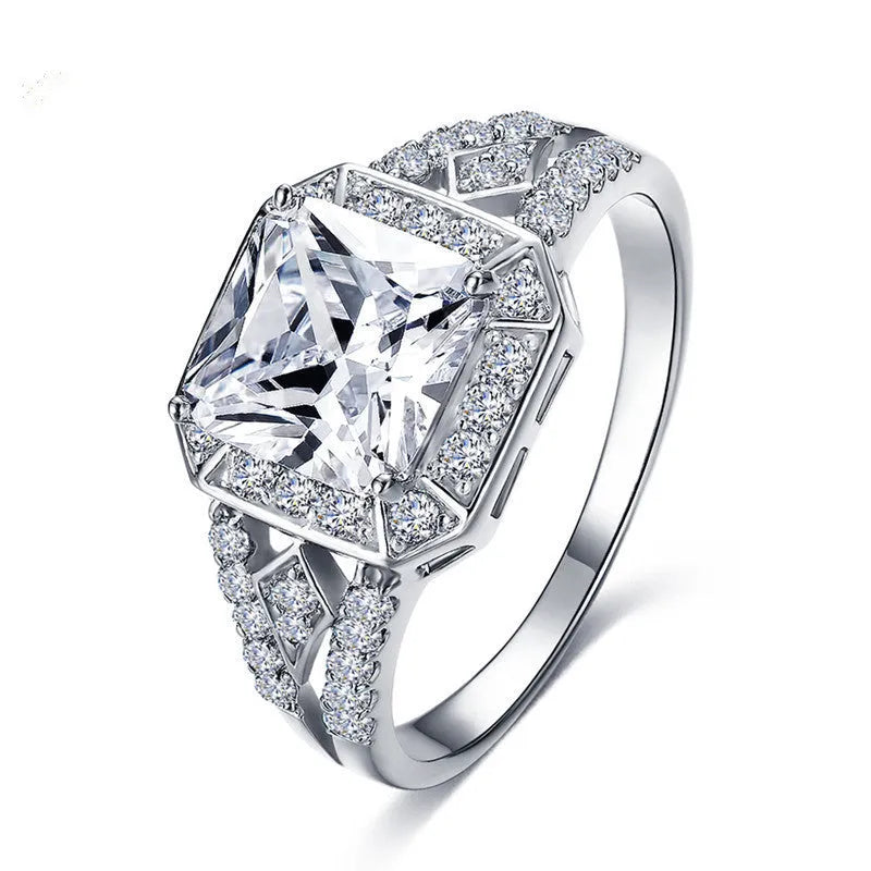 Women's geometric zircon ring with hollow ornamental design and quadrilateral pattern in platinum colour