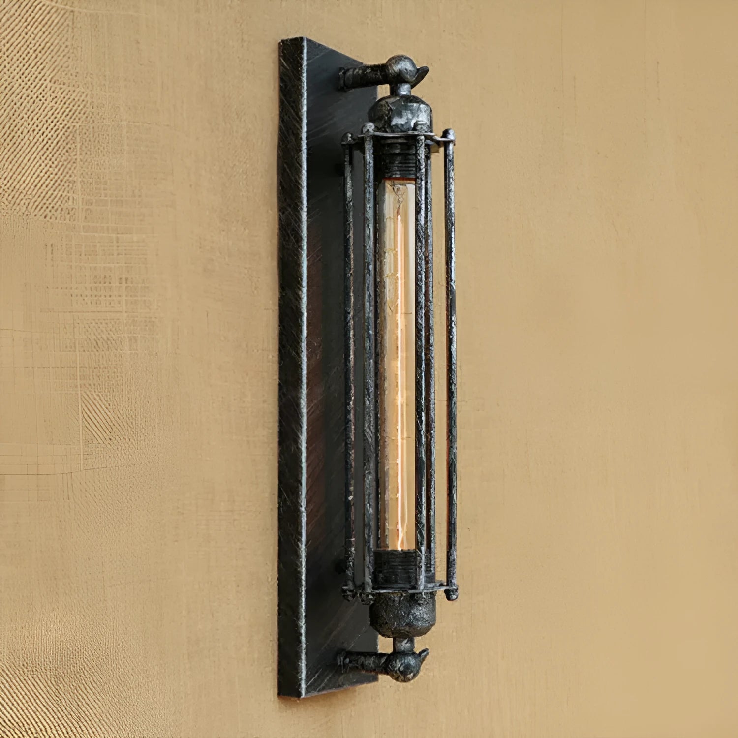 Industrial retro iron wall lamp in antique bronze finish showing flute design.
