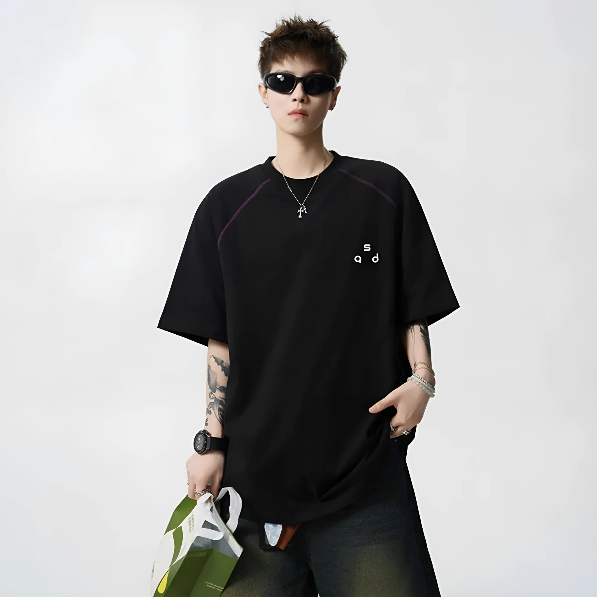 Men's loose fit cotton T-shirt with letter print design in black colour showing short sleeves and round neck