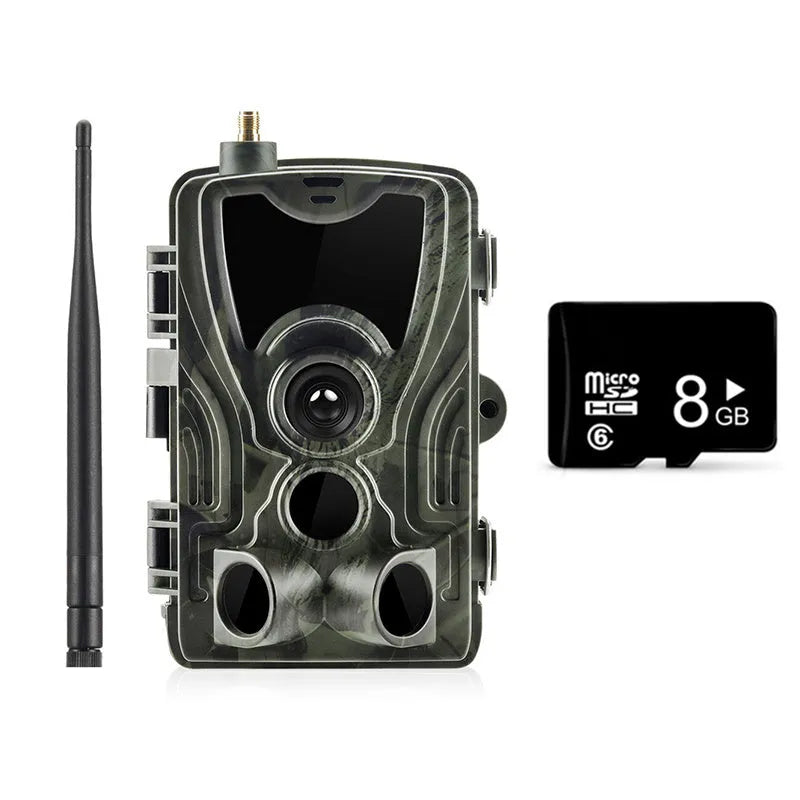 Outdoor camouflage surveillance camera with wide-angle lens on a green background.