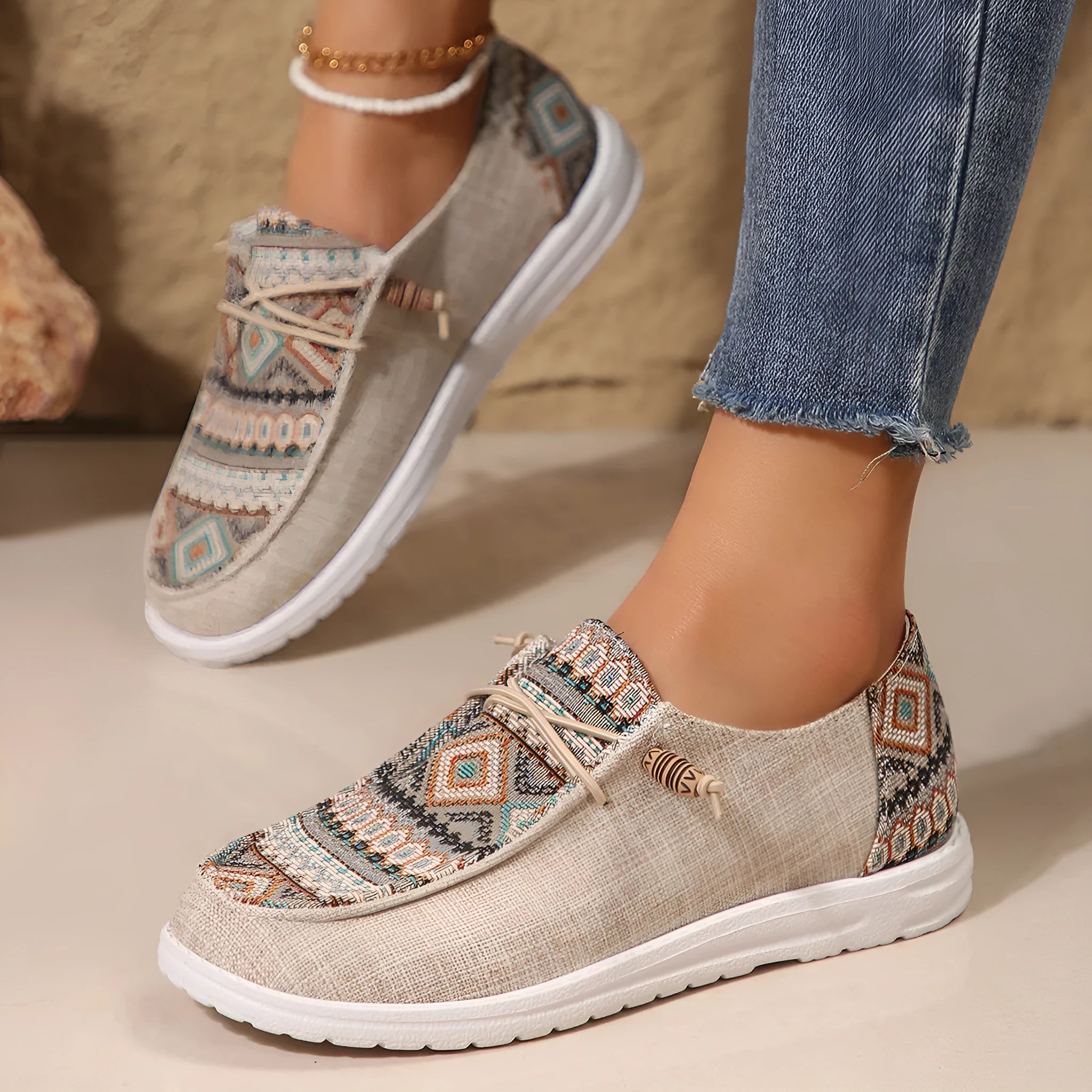 Women's flat round toe shoes in black, dark grey, and khaki with a low-top design and rubber sole.