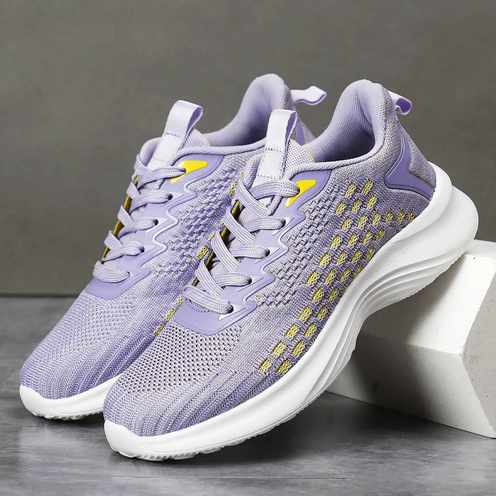 Women's lavender purple Flyknit running shoes with mesh fabric and striped pattern