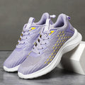 Women's lavender purple Flyknit running shoes with mesh fabric and striped pattern