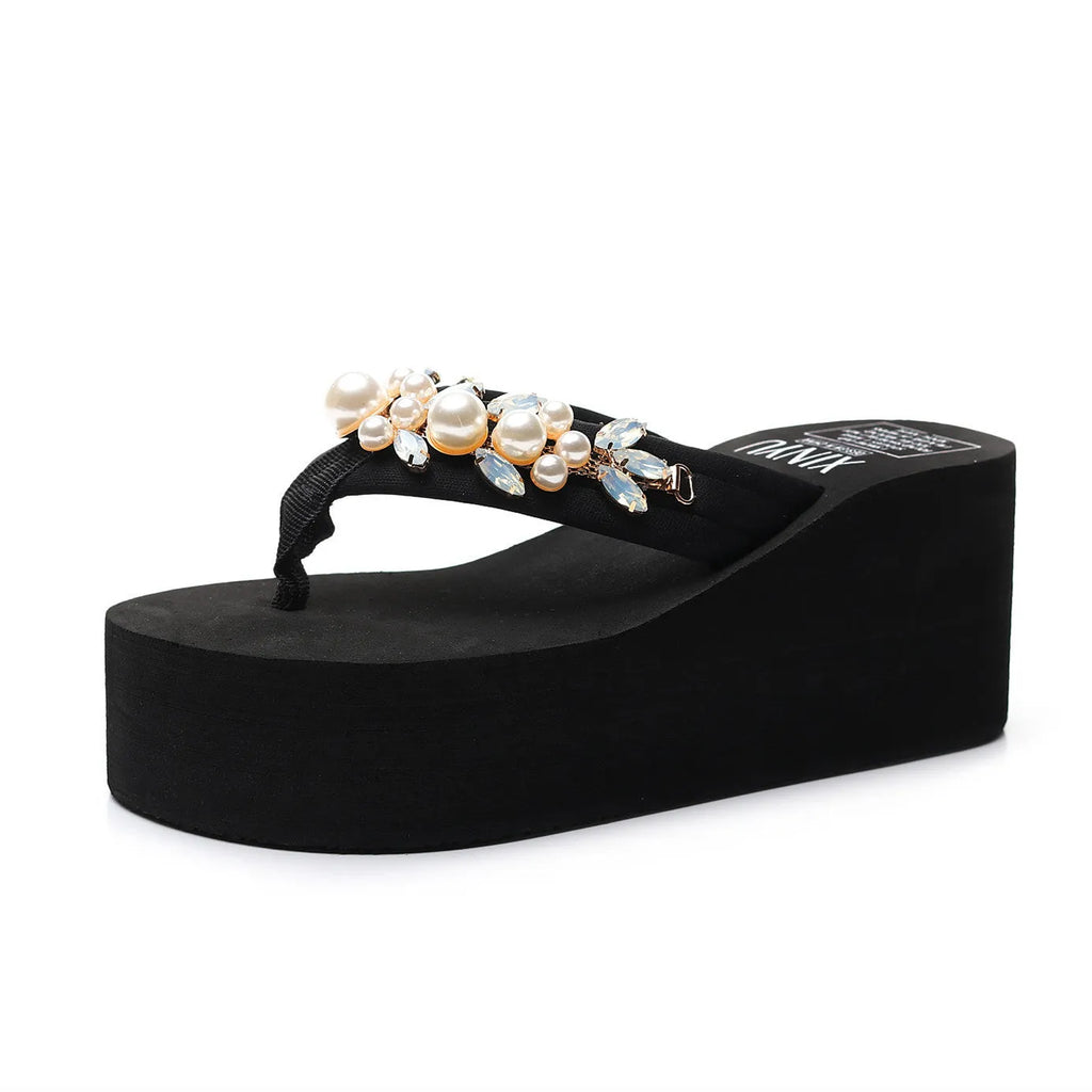 Women's high-heeled flip-flops with cotton cloth upper in black or beige colour, available in sizes 35 to 40.