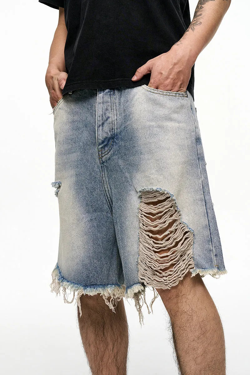 Men's light blue baggy denim shorts with wide leg retro washed design