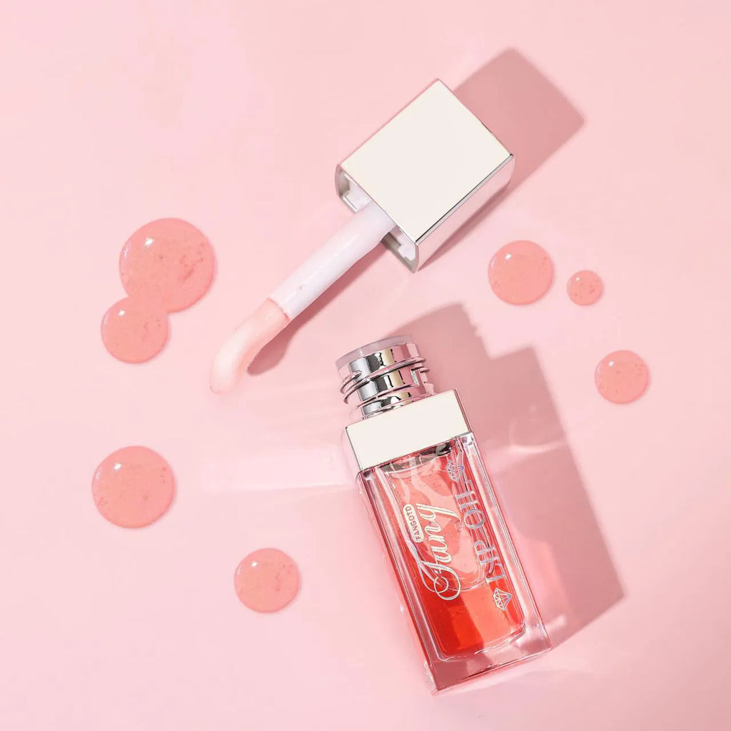 Five colour shades of a moisturising lipstick and lip gloss hybrid product with repairing lip essence oil.